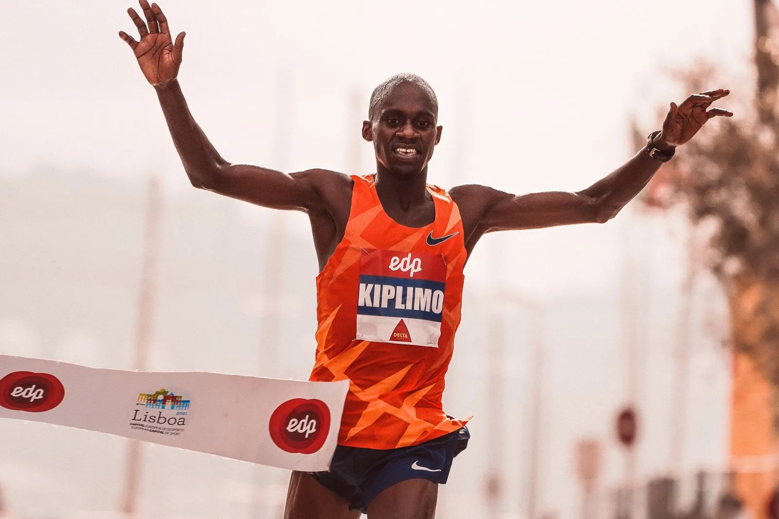 A runner approaches the finish of a road race