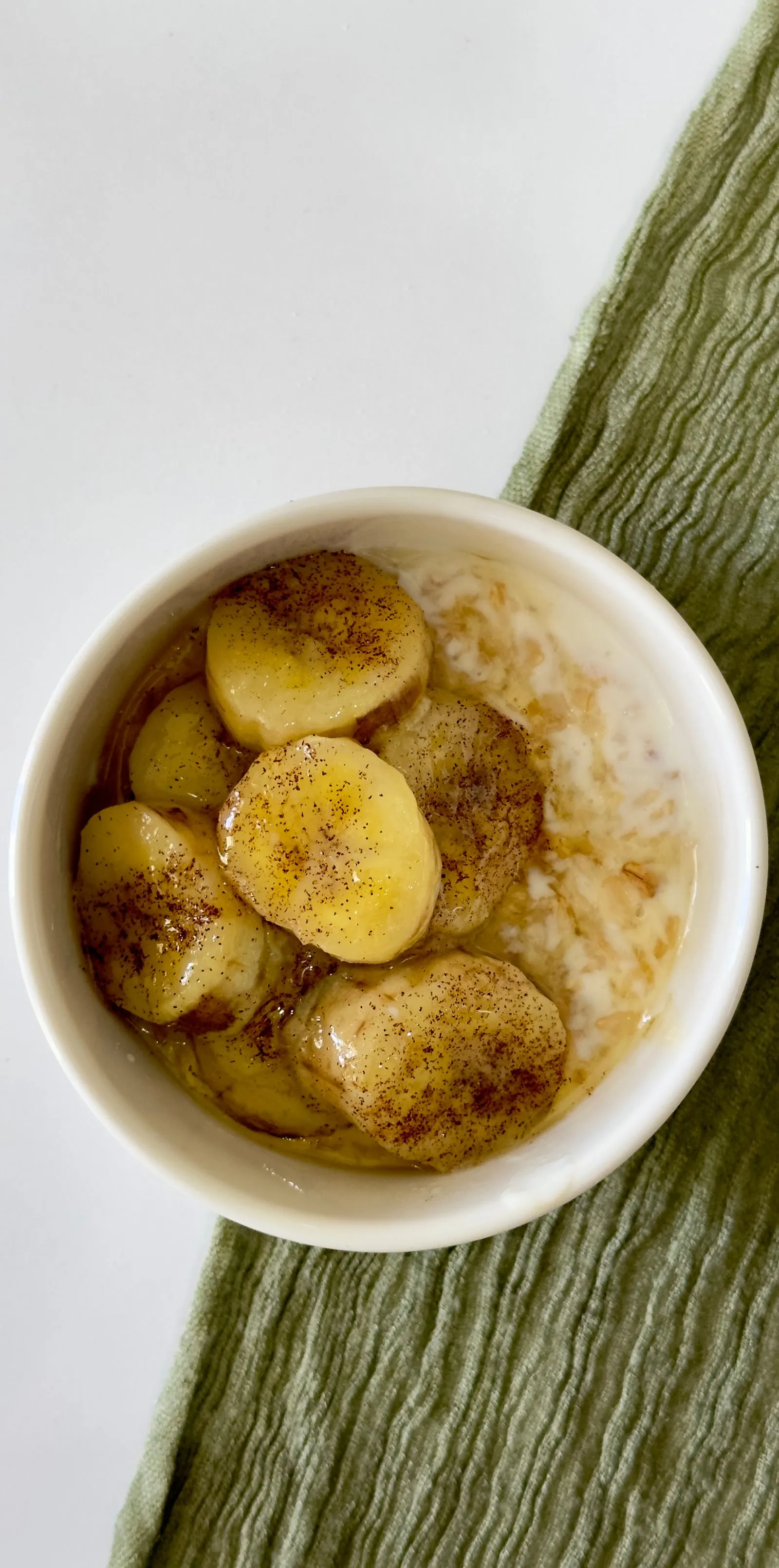 Oatmeal topped with banana and cinnamon