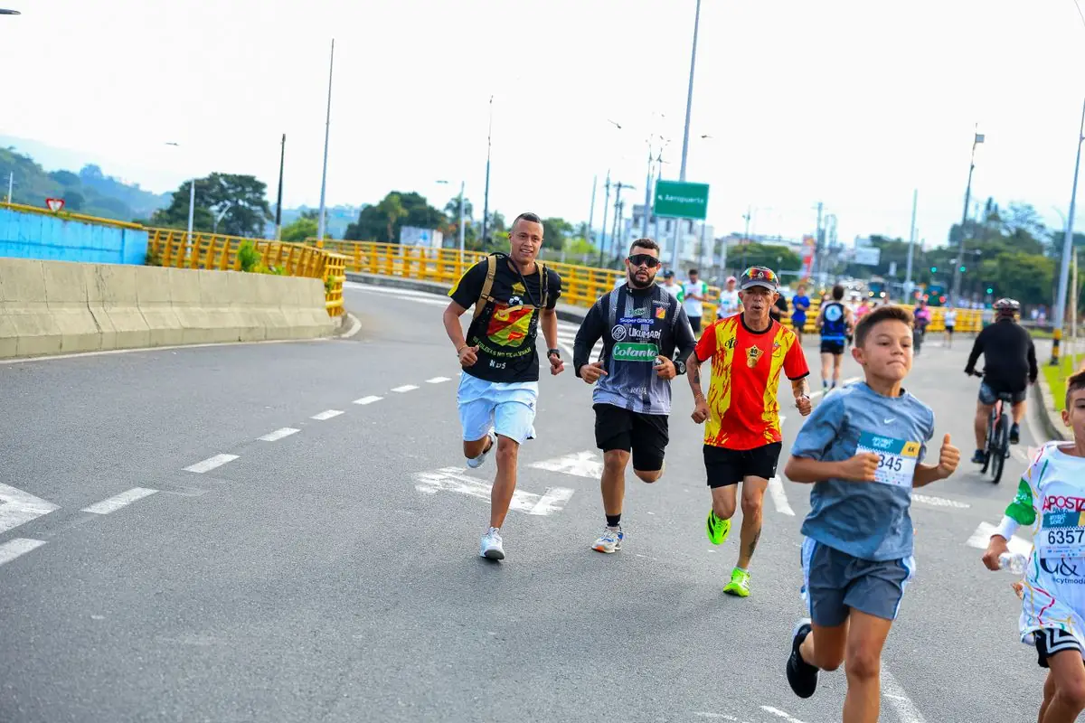 Marathon runners on a city road.